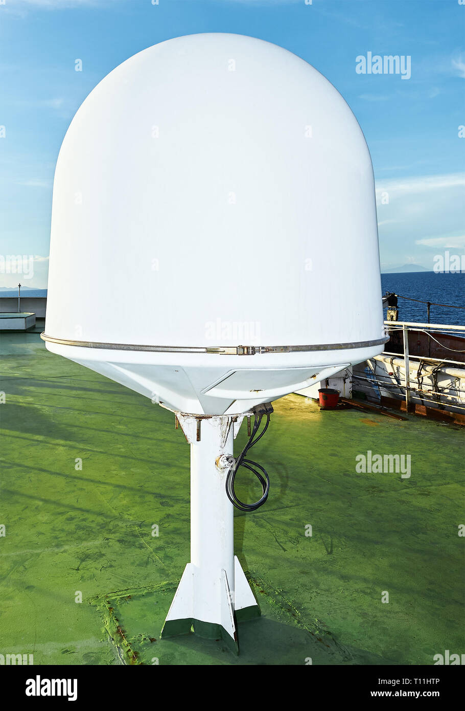 Tablas, Romblon Province, Philippines: Egg shaped satellite radar equipment standing on a deck of a ship in the Philippines Stock Photo