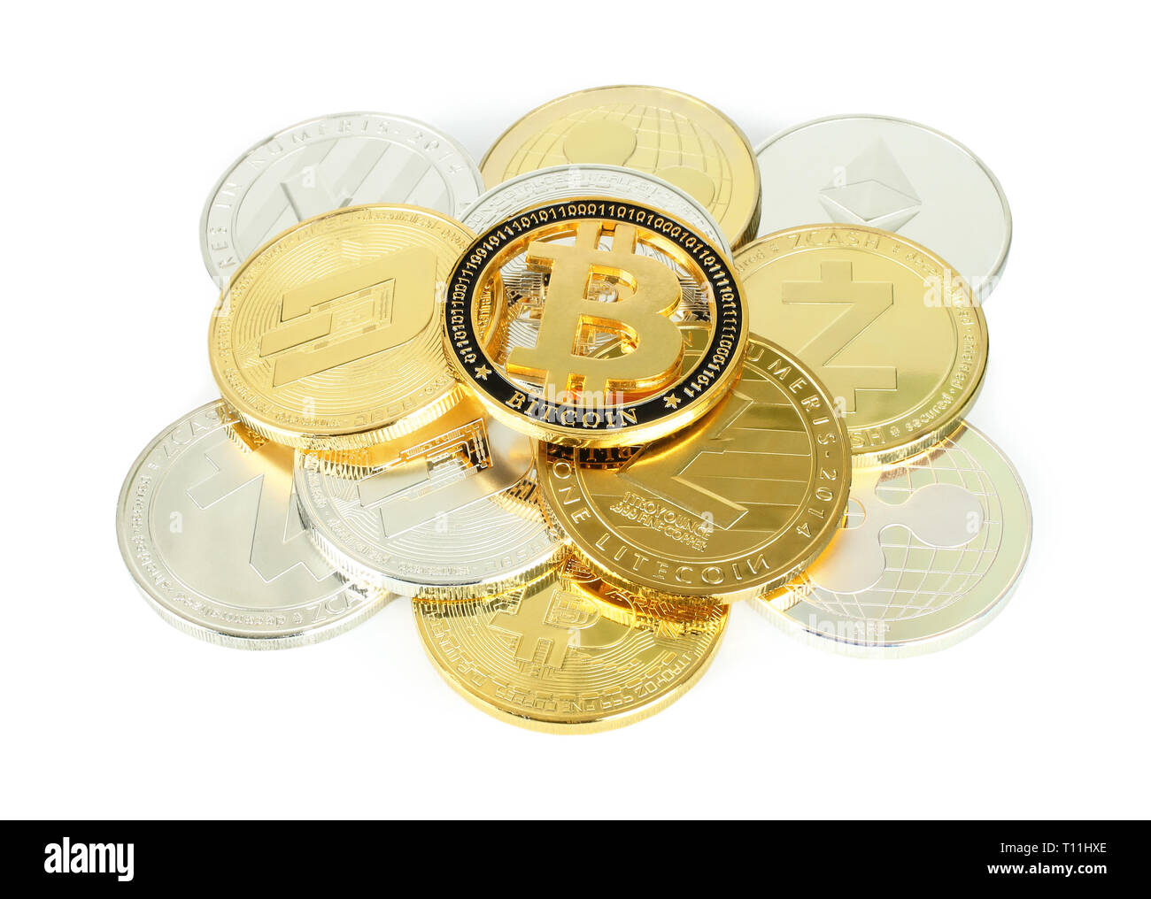 Cryptocurrency coins on white background close-up Stock Photo - Alamy