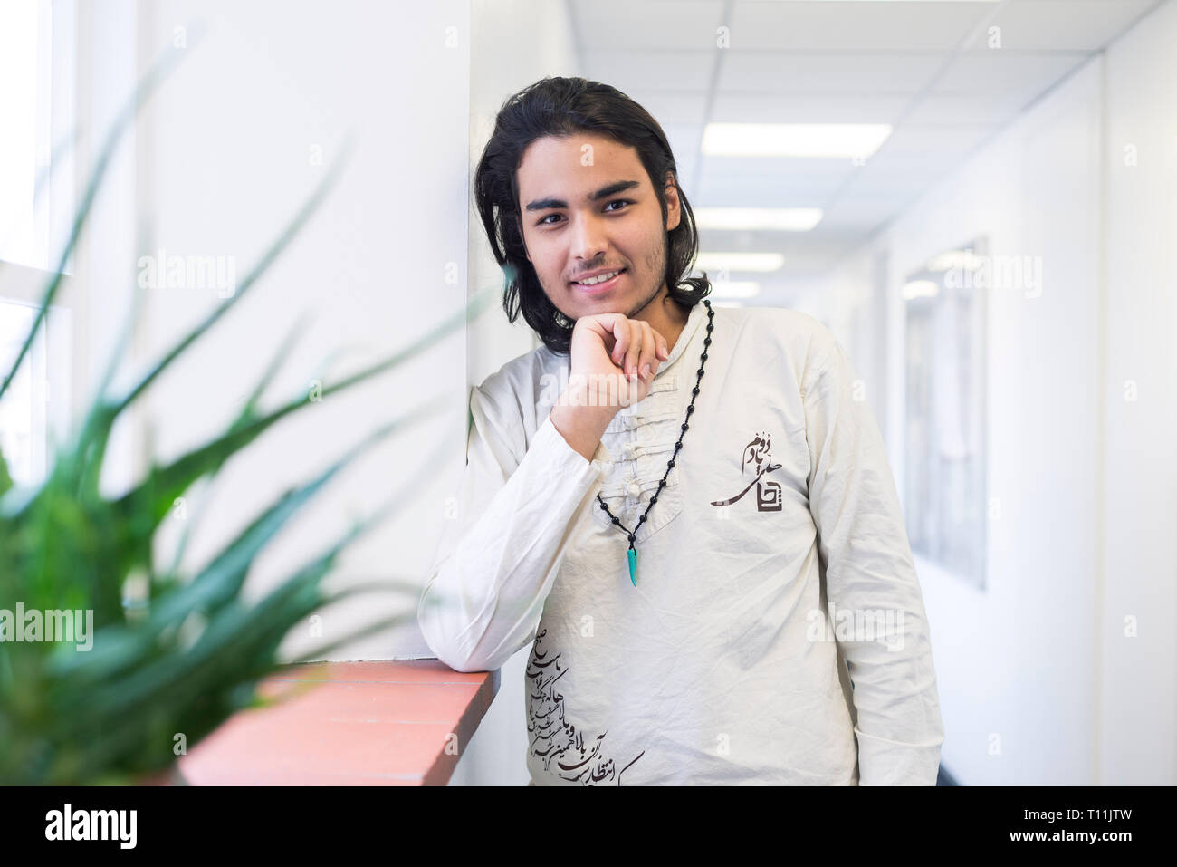 Young happy middle eastern man hi-res stock photography and images - Alamy