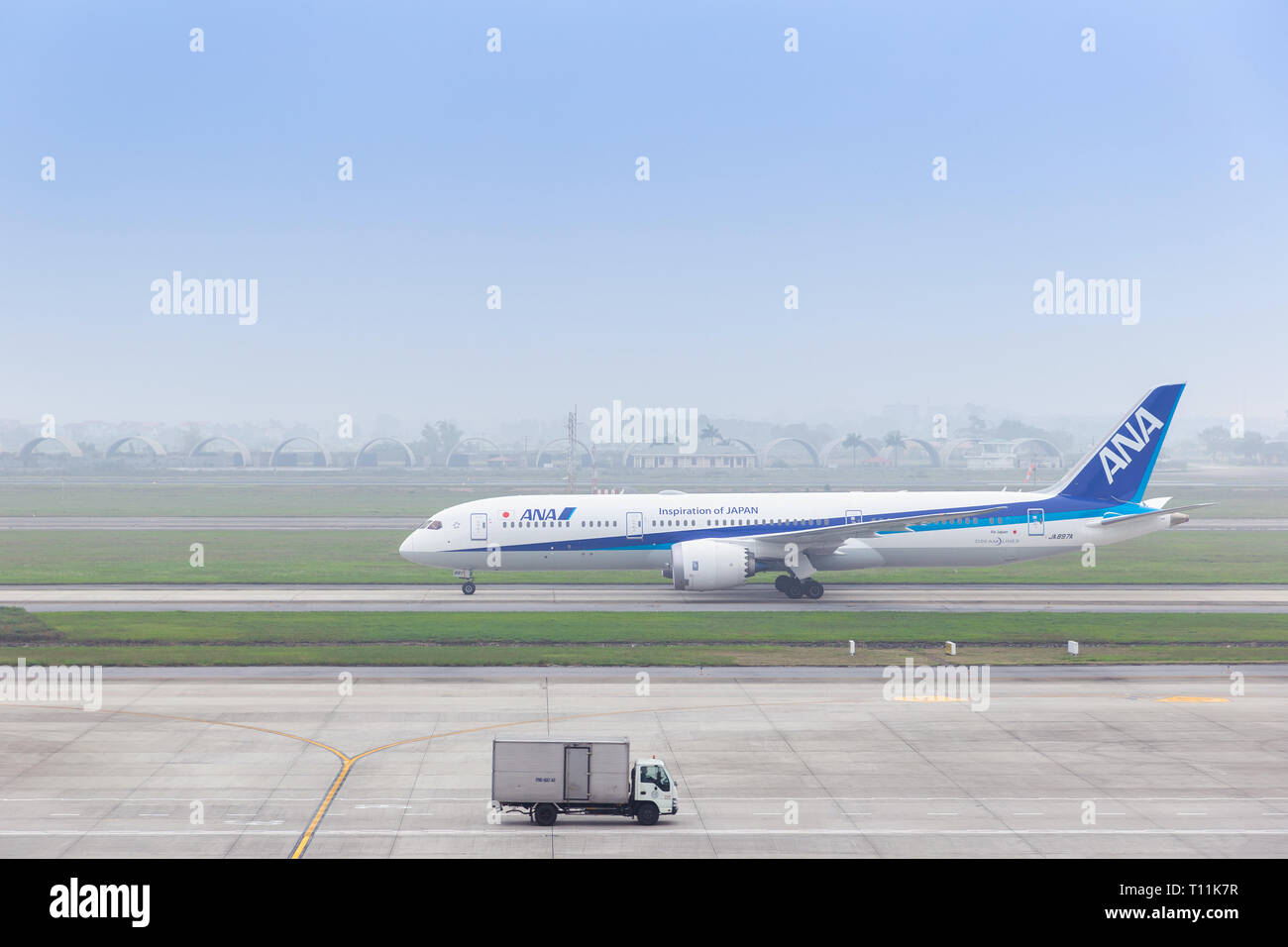 HANOI, VIETNAM - March 9, 2019 : All Nippon Airways (ANA) Japan aircraft taxiing on runway of Noi Bai international airport in Hanoi (HAN), Vietnam. Stock Photo