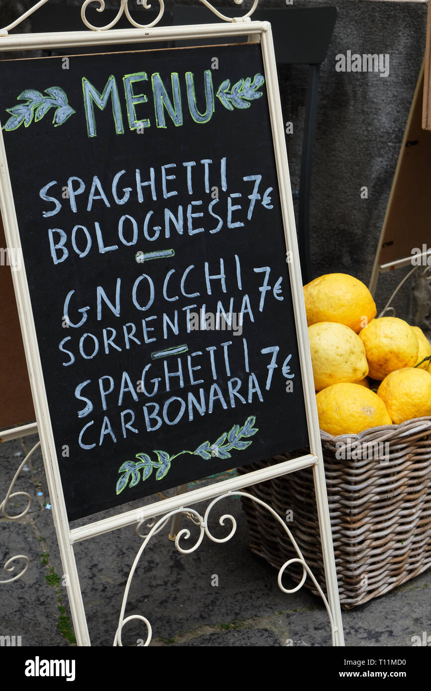 Italian restaurant blackboard in the street of Sorrento Stock Photo