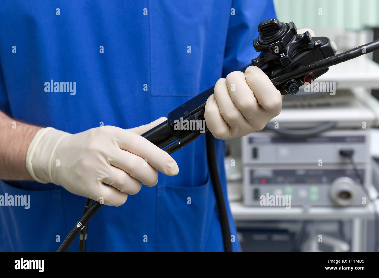 endoscope is in the hands of the doctor Stock Photo