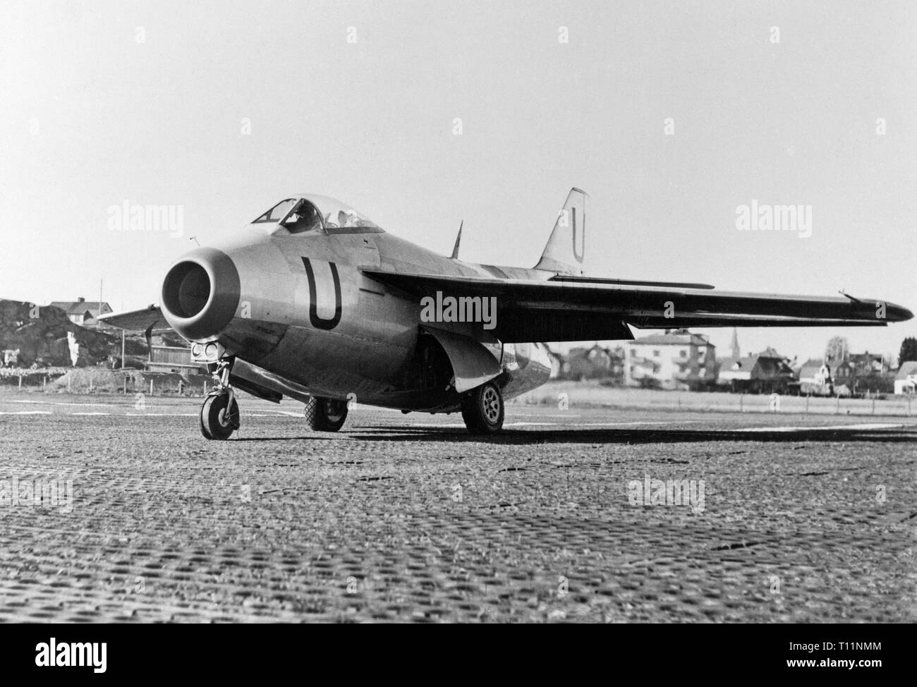 The Saab 29 Tunnan is a Swedish fighter that was designed and manufactured by Saab in the 1940s. It was Sweden's second turbojet-powered combat aircraft, the first having been the Saab 21R; additionally, it was the first Western European fighter to be produced with a swept wing after the Second World War, the Me 262 having been the first during the war. Despite its rotund appearance, from which its name derives, the J 29 was a fast and agile aircraft for its era. It served effectively in both fighter and fighter-bomber roles into the 1970s. Stock Photo
