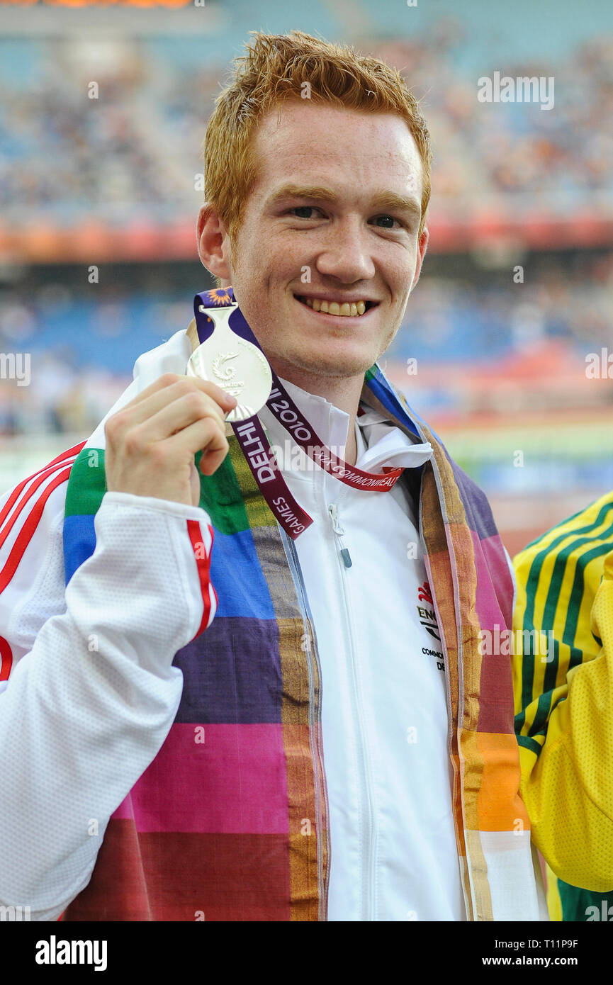 Greg Rutherford Podium DELHI, INDIA - OCTOBER 10: Greg Rutherford (Silver) posing on the ...