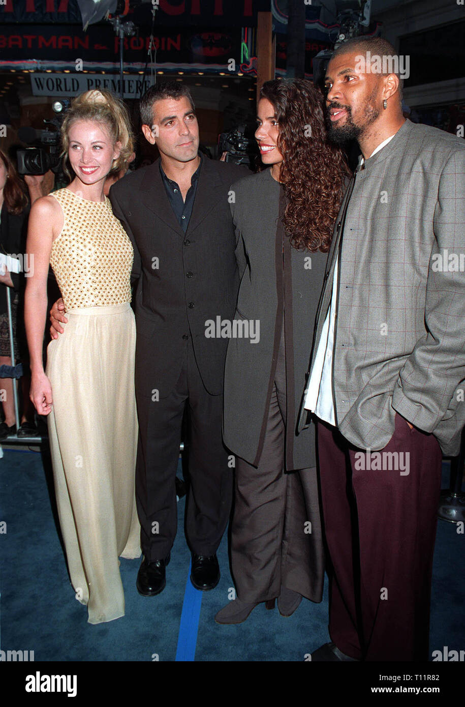 LOS ANGELES, CA. June 13, 1997: "Batman & Robin" star George Clooney &  girlfriend Celine Balitran & his "ER" co-star Eric LaSalle & wife at the  World Premiere of "Batman & Robin"