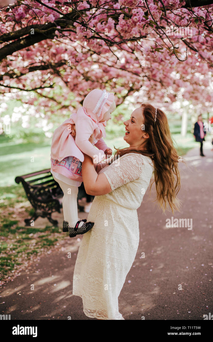 Cherry Blossoms, Tulips, and Floral Maternity Photoshoots in