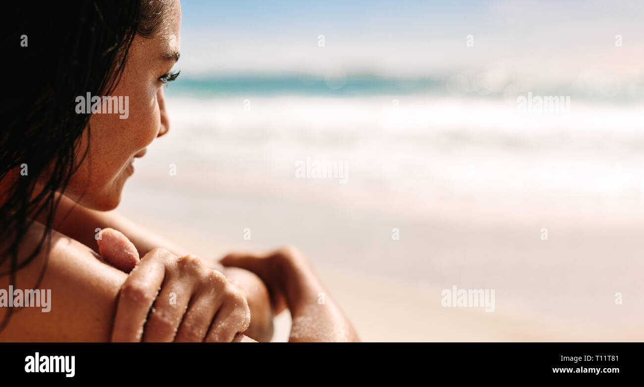 Woman on beach looking towards hi-res stock photography and images - Alamy