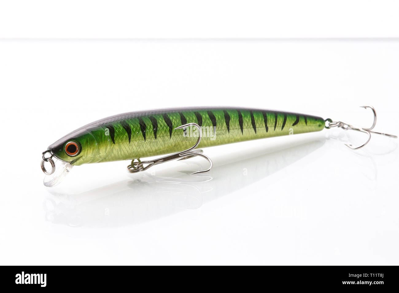 Lure Wobbler Popper on Wood Background with an two hooks. Relax at