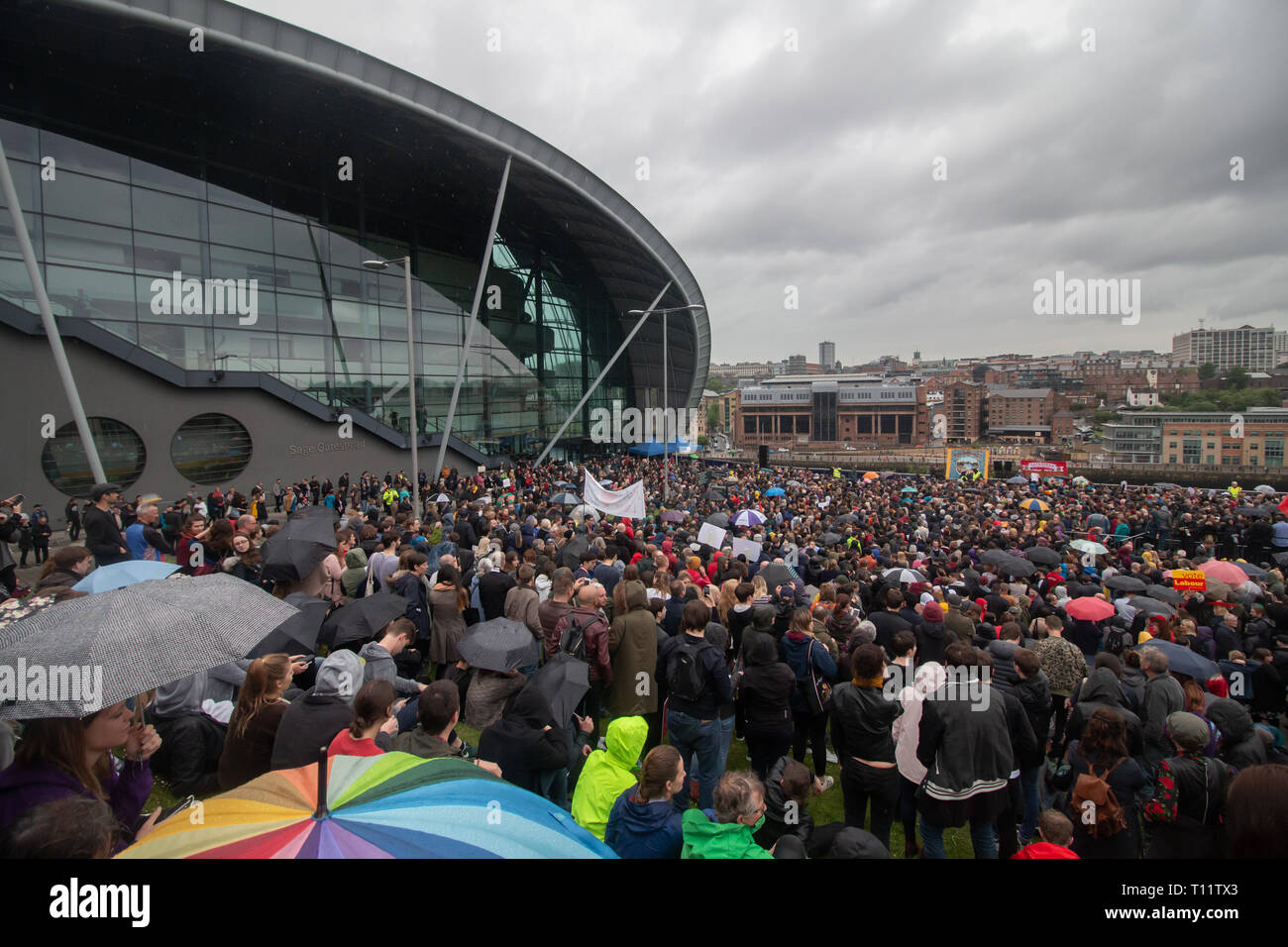 Labour Election Rally at Sage Gateshead 2017. Speakers leader Jeremy Corbyn & Ian Lavery MP. Thousands turned out on a rainy afternoon with banners. Stock Photo