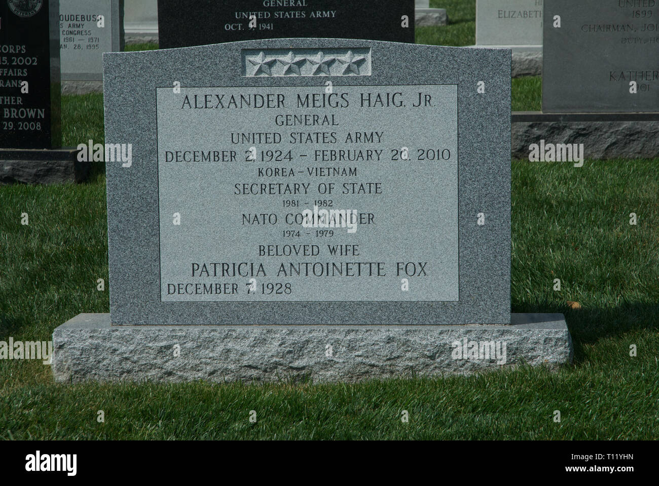 Arlington National  Cemetery. 4-20-2012 Tombstone of Alexander Meigs Haig Jr. Secretary of State, Nato Commander. Arlington National Cemetery, in Arlington County, Virginia, directly across the Potomac River from the Lincoln Memorial, is a United States military cemetery beneath whose 624 acres (253 ha) have been laid casualties, and deceased veterans, of the nation's conflicts beginning with the American Civil War, as well as reinterred dead from earlier wars. It was established during the Civil War on the grounds of Arlington House, which had been the estate of the family of Confederate gene Stock Photo