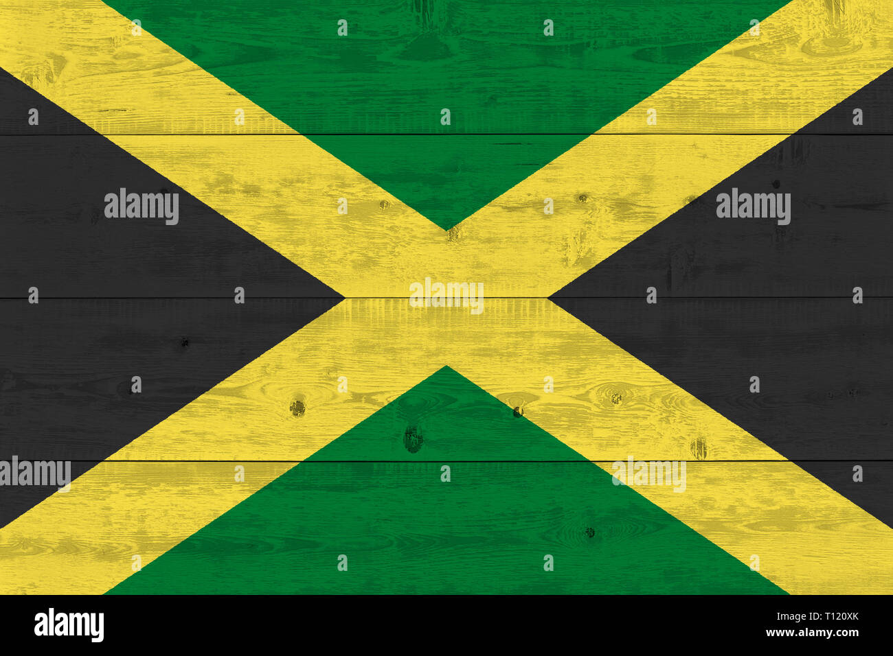 Jamaica flag painted on old wood plank. Patriotic background. National flag of Jamaica Stock Photo