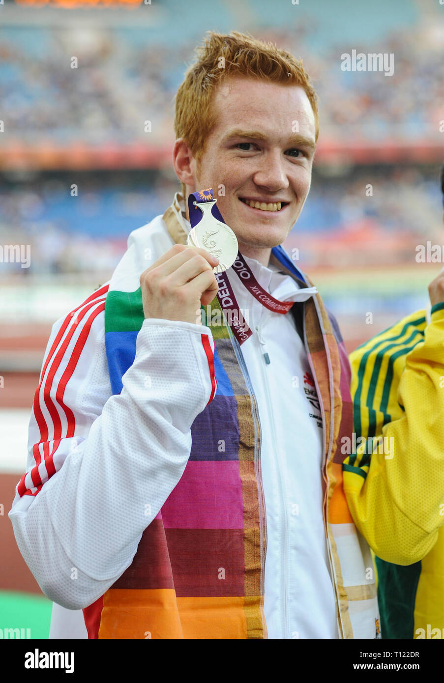 Greg Rutherford Podium DELHI, INDIA - OCTOBER 10: Greg Rutherford (Silver) receiving his medal ...