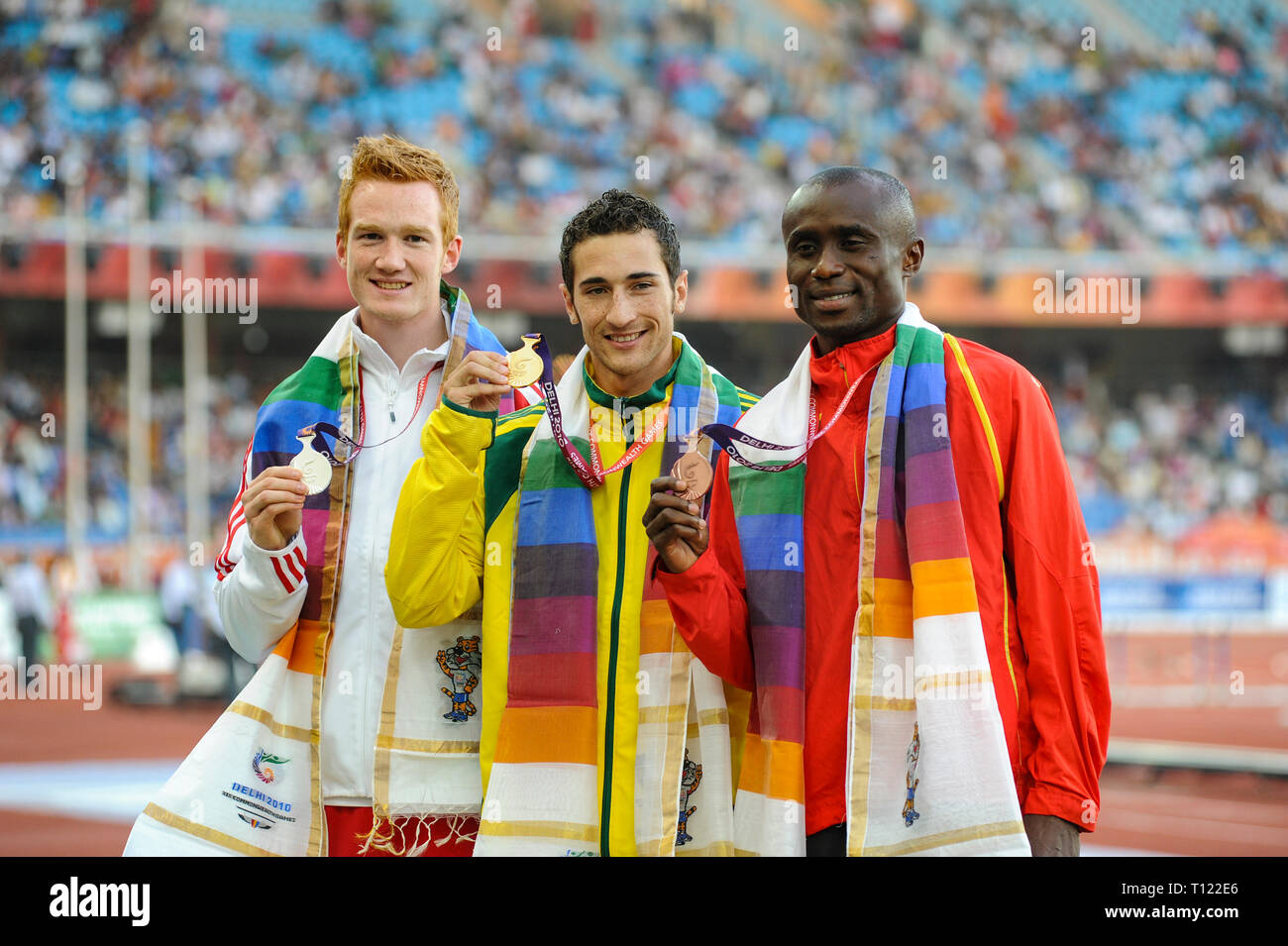 Greg Rutherford Podium DELHI, INDIA - OCTOBER 10: Greg Rutherford (Silver) receiving his medal ...