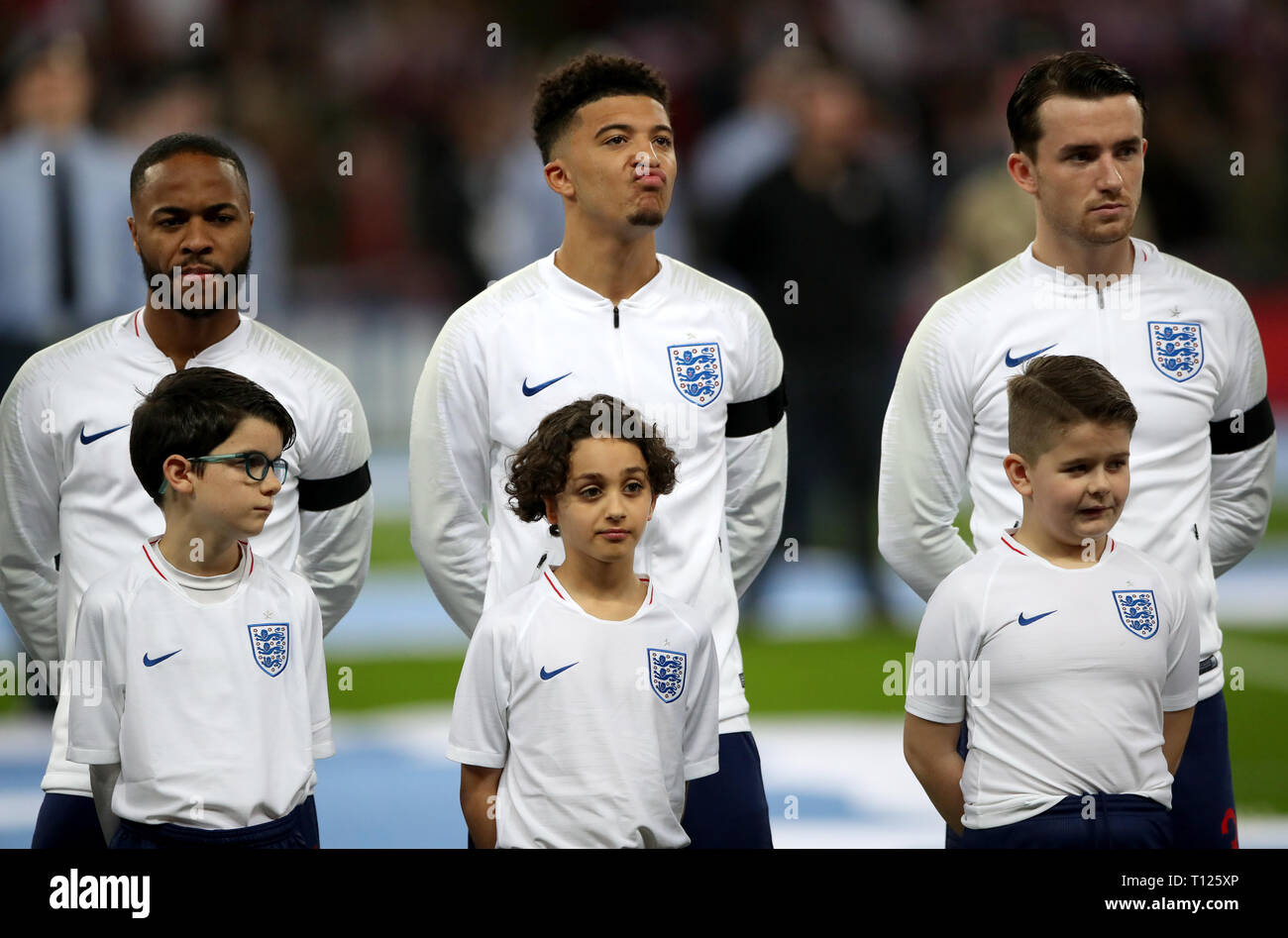 England's Raheem Sterling (left), Jadon Sancho (centre) and Ben Chilwell line up prior to the UEFA Euro 2020 Qualifying, Group A match at Wembley Stadium, London. Stock Photo