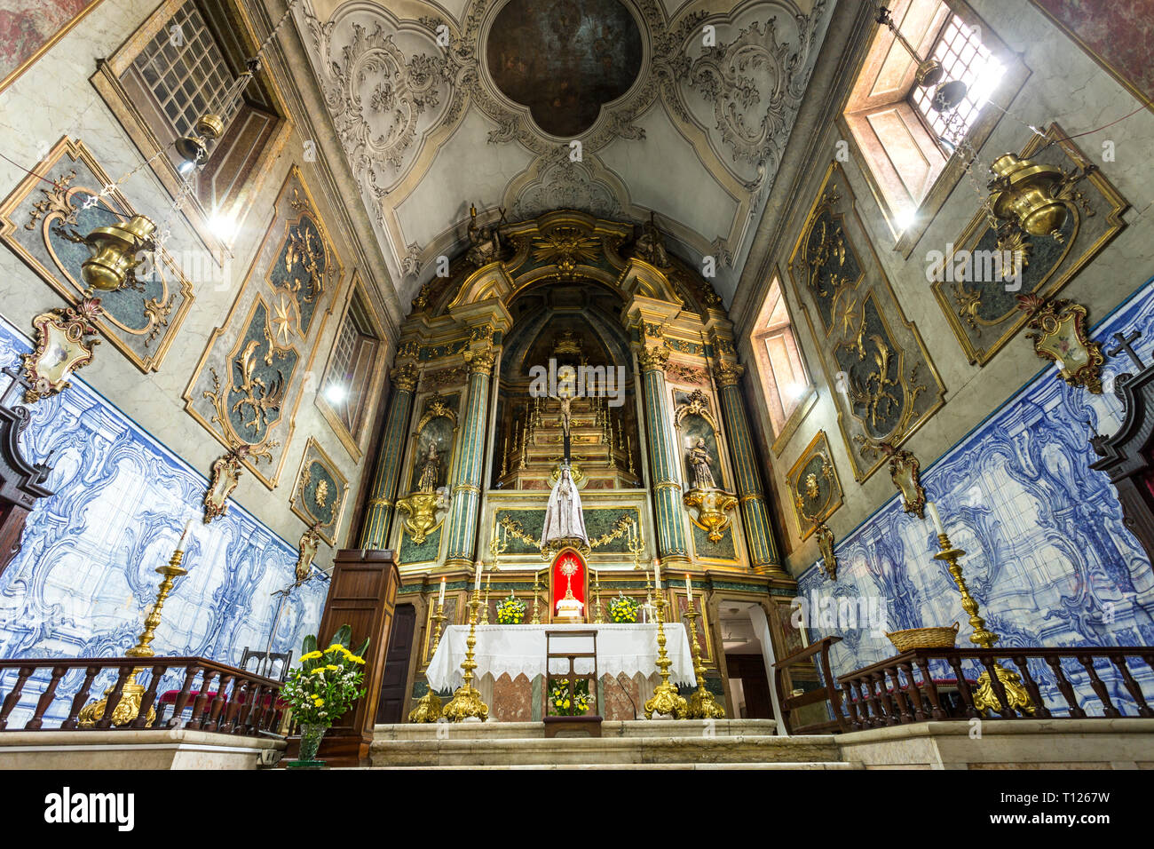 The altarpiece in the main chapel of the Church of the Flamengas at the Convent of Our Lady of Quietude, in Alcantara, Lisbon, Portugal Stock Photo