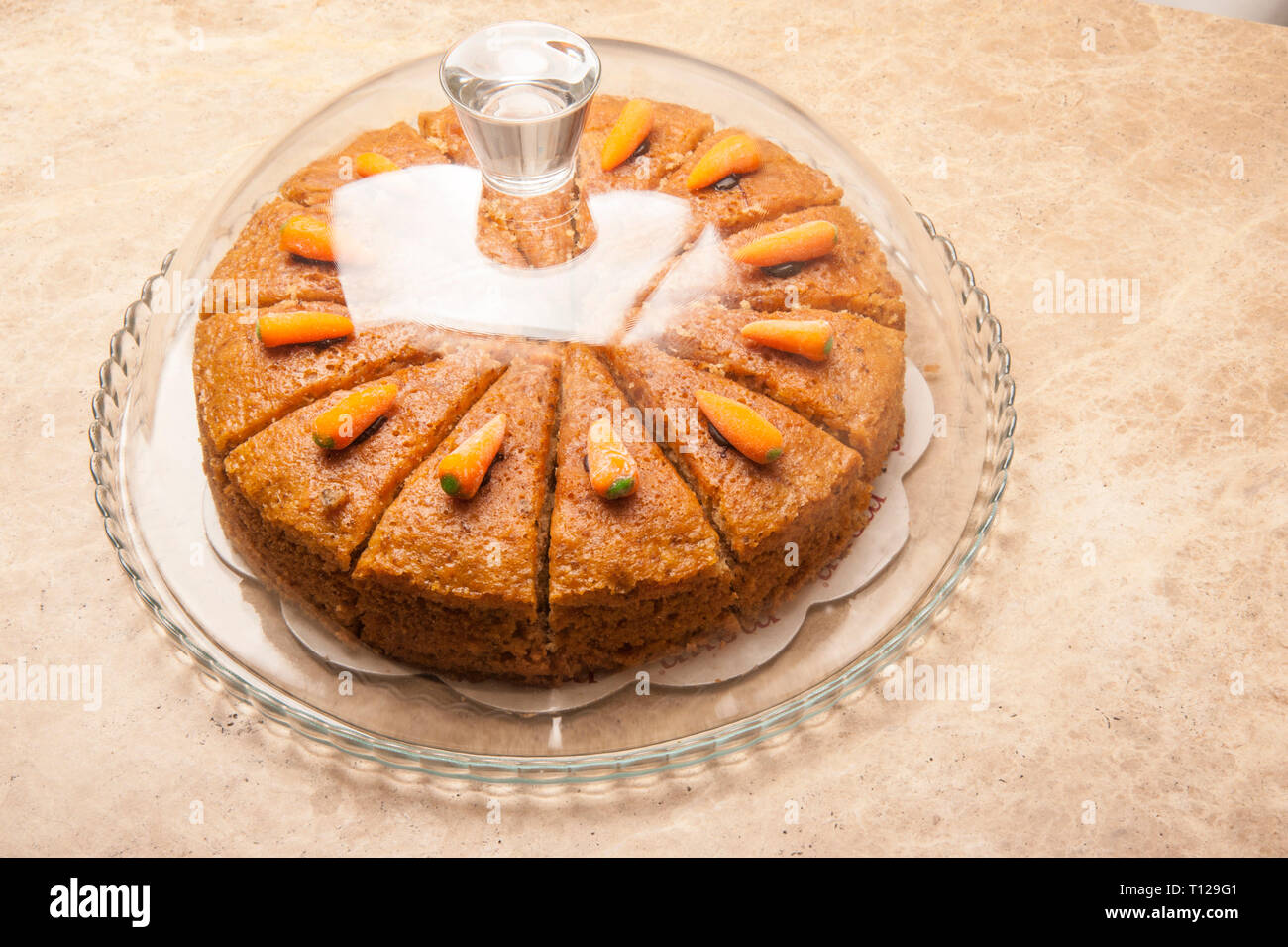 Carrot cake ready to be served. Triangle-sliced carrot cake is the favorite dessert of people especially those who are fond of taste. Stock Photo