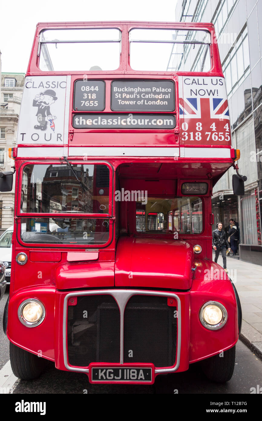 A Classic Tour open top, hop-on-hop-off, converted London Routemaster Bus on Fleet Street, London, UK Stock Photo