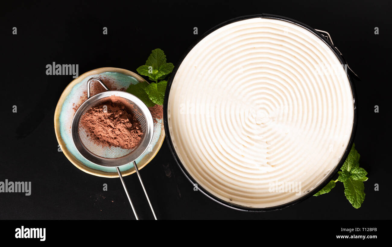 Food concept making dessert  homemade banoffee pie on black background Stock Photo