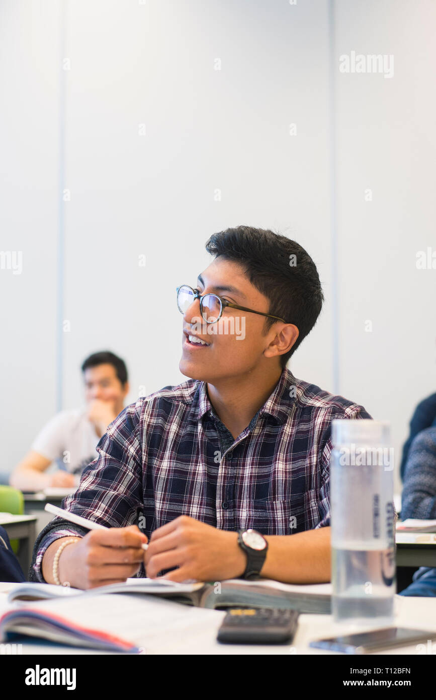 A busy classroom full of multicultural students during a lesson Stock ...