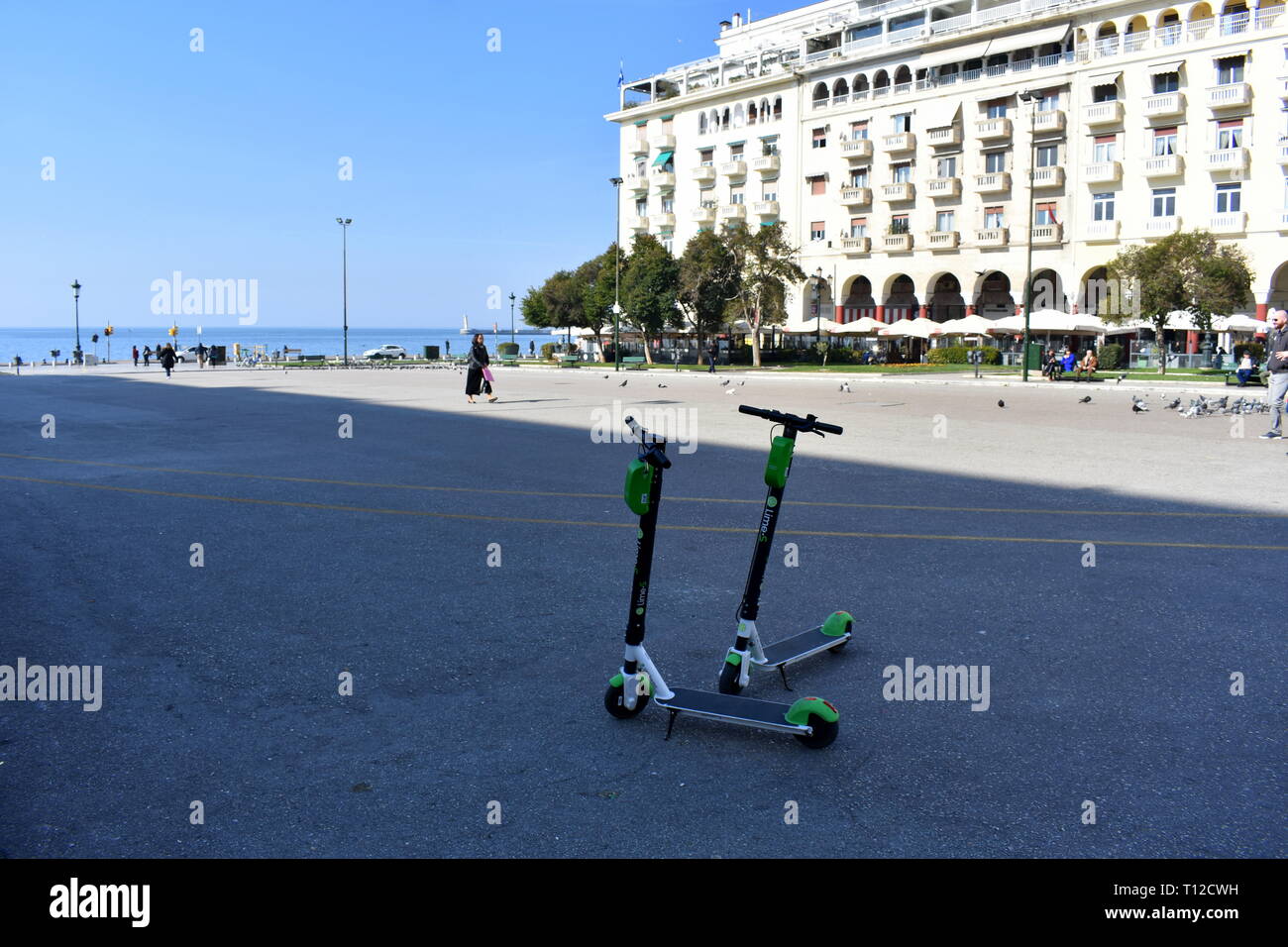 Pair of electric scooters hires stock photography and images Alamy