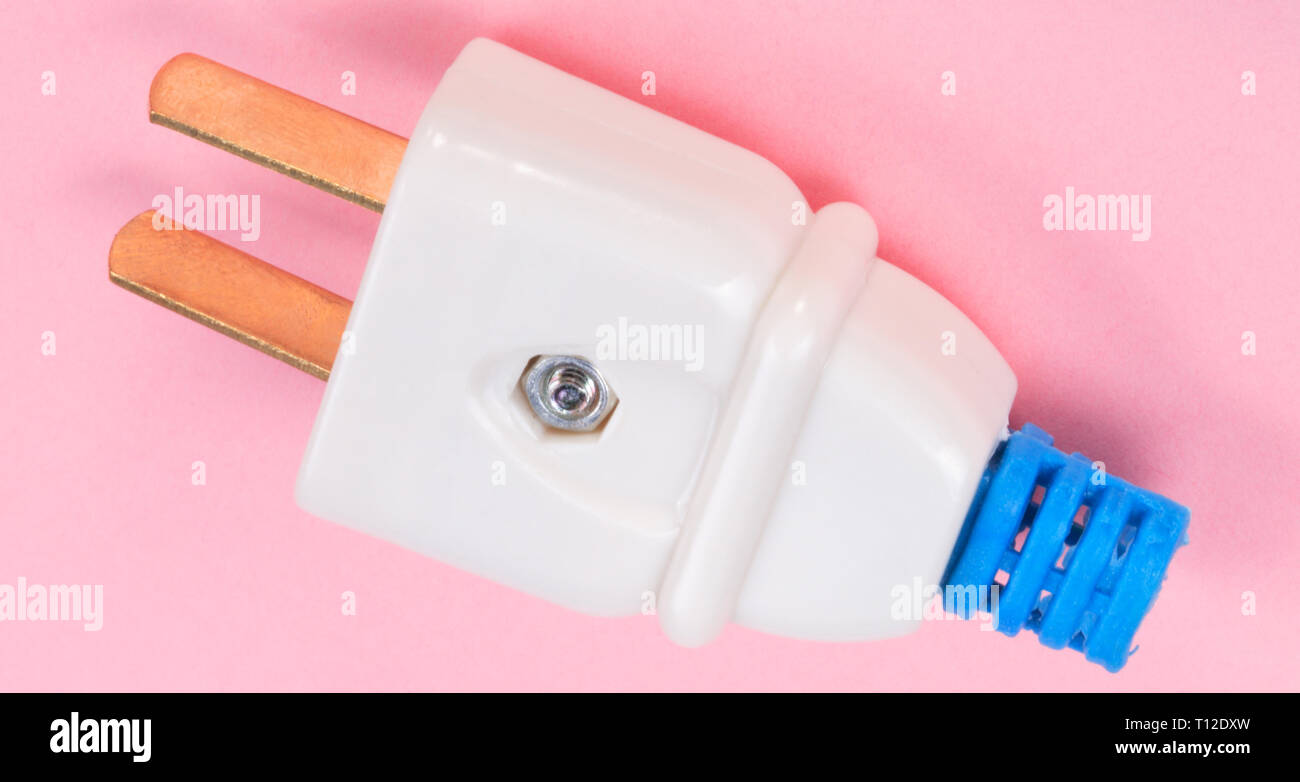 American Outlet Plug on pink background Stock Photo - Alamy