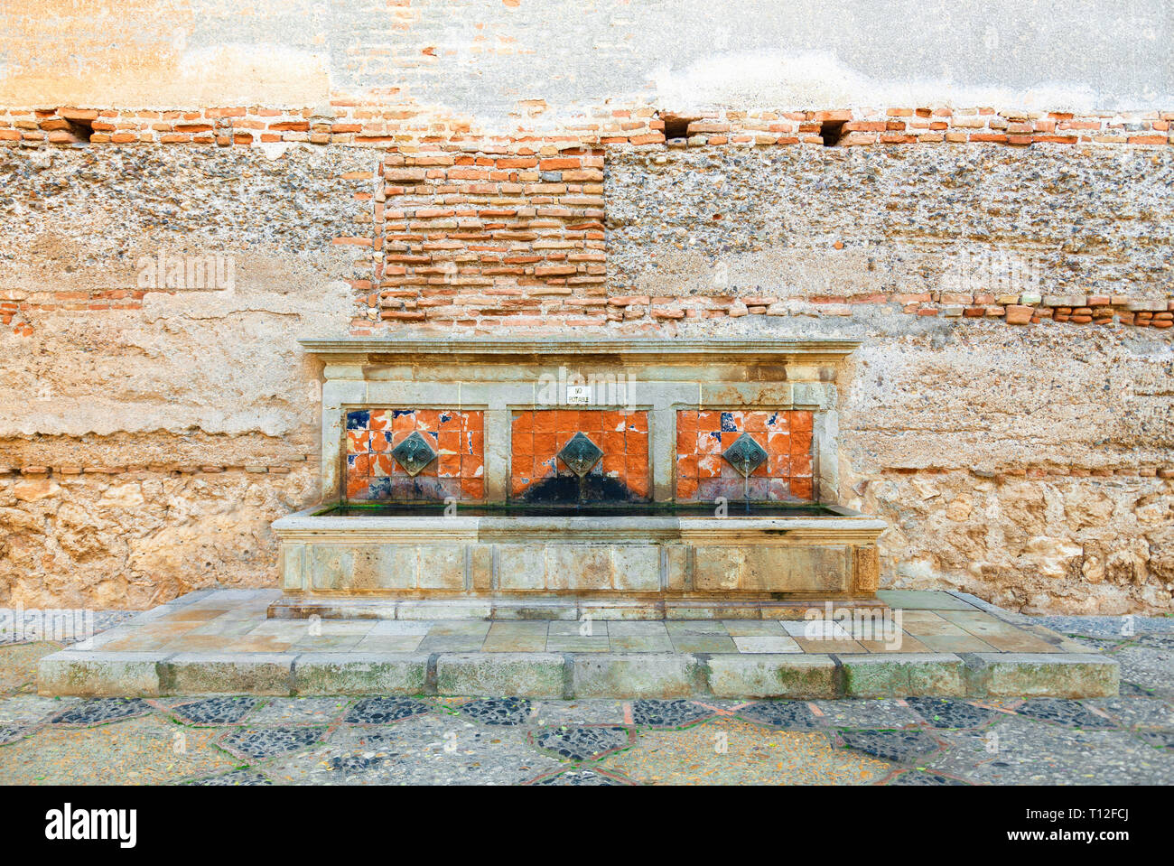 medieval drinking fountains in the old fortress Stock Photo Alamy
