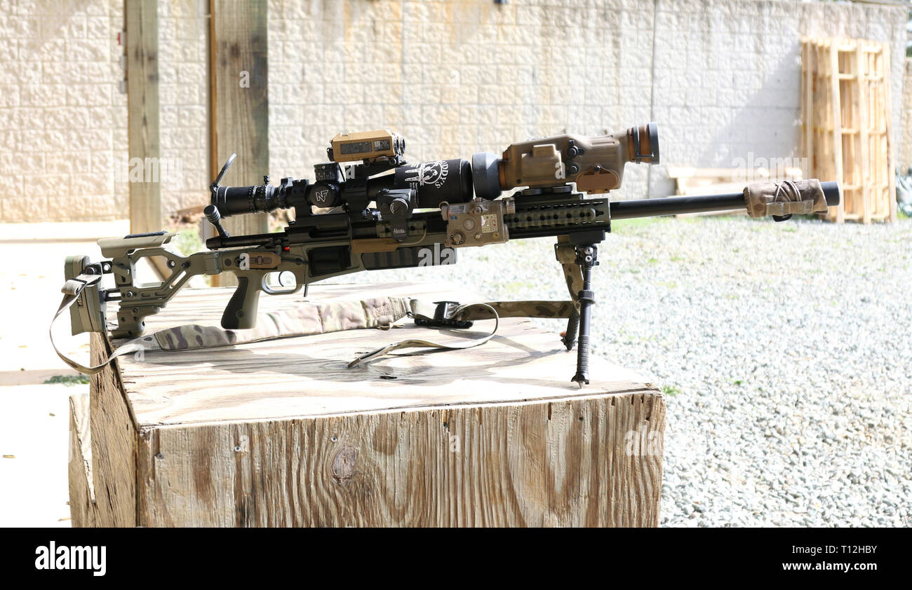 A competitor’s rifle is shown at the United States Army Special Operations Command International Sniper Competition at Fort Bragg, North Carolina, March 18, 2019. Twenty-one teams competed in the USASOC International Sniper Competition where instructors from the United States Army John F. Kennedy Special Warfare Center and School designed a series of events that challenged the two-person teams’ ability to work together, firing range, speed and accuracy in varied types of environments. (U.S. Army photo by K. Kassens) Stock Photo