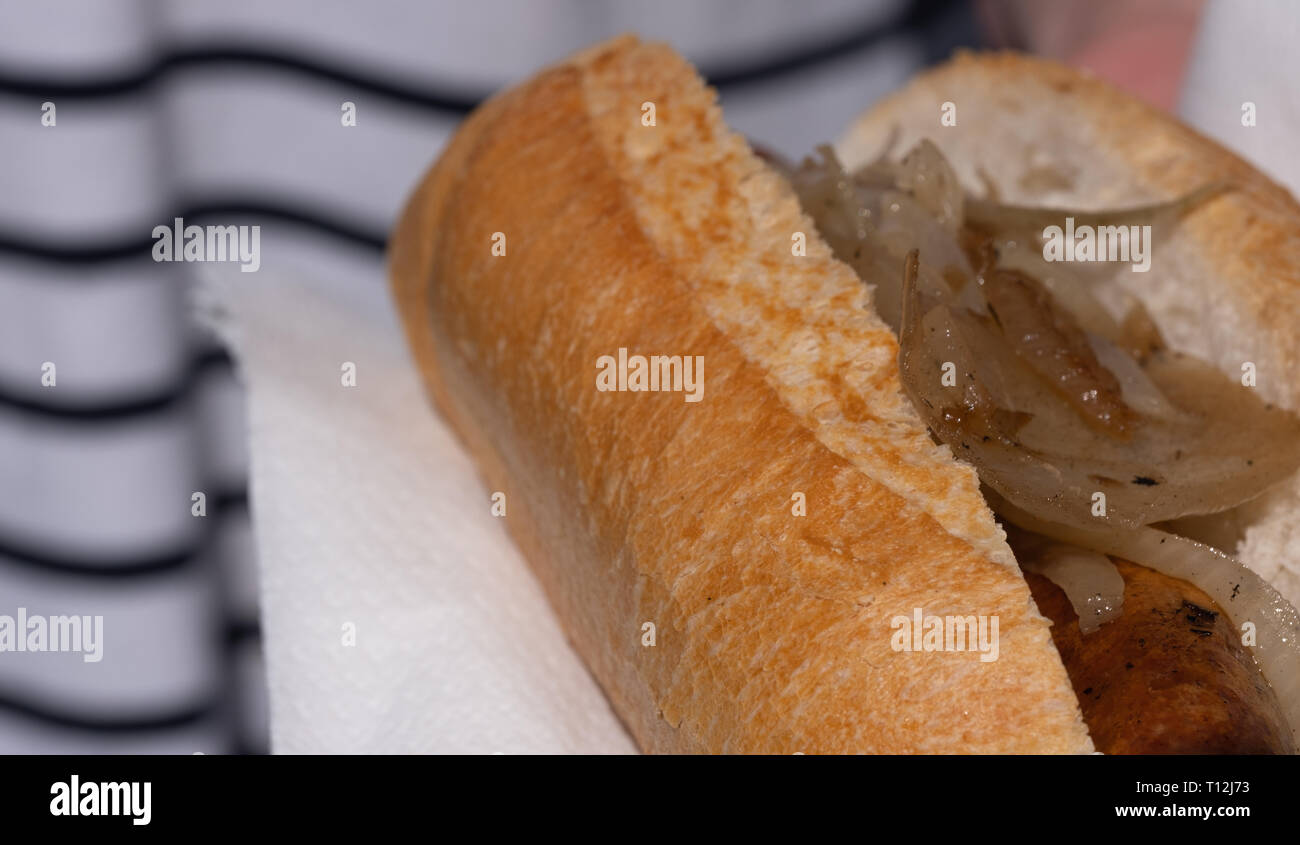 Closeup image of a cooked sausage in a bread roll at an Australian election barbecue fund raiser Stock Photo