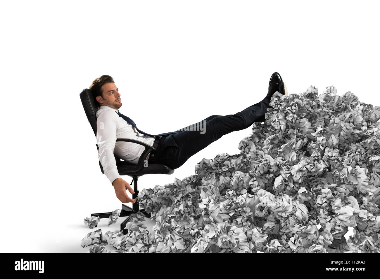 Businessman with paper sheet anywhere. Buried by bureaucracy. Concept of overwork Stock Photo