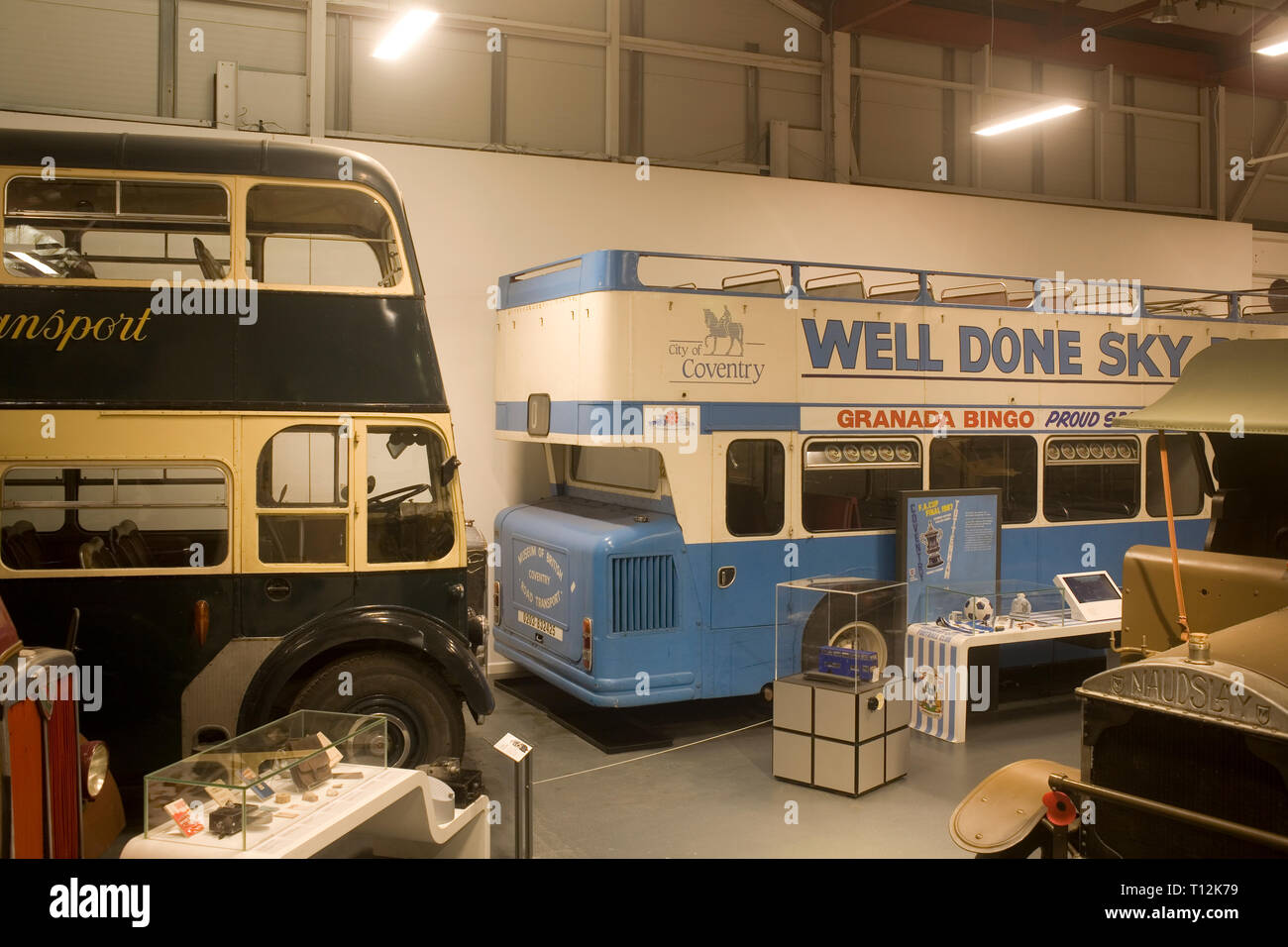 Buses including a bus repainted to celebrate Coventry's win in the 1987 FA cup at Coventry transport museum Stock Photo