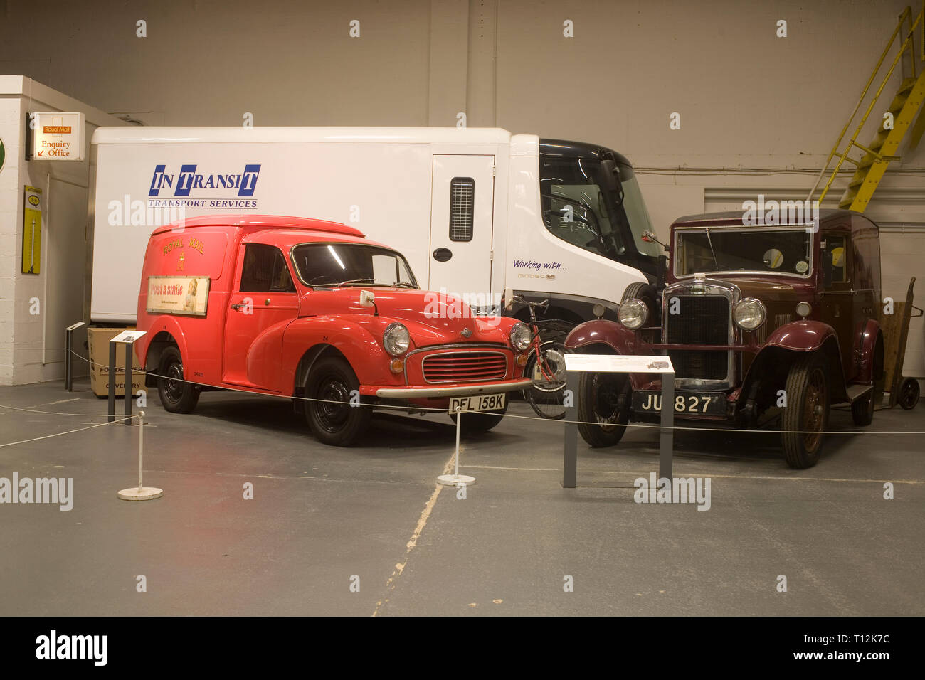 Red Morris post office van, 1931 Singer van and post office bicycle at Coventry transport museum Stock Photo
