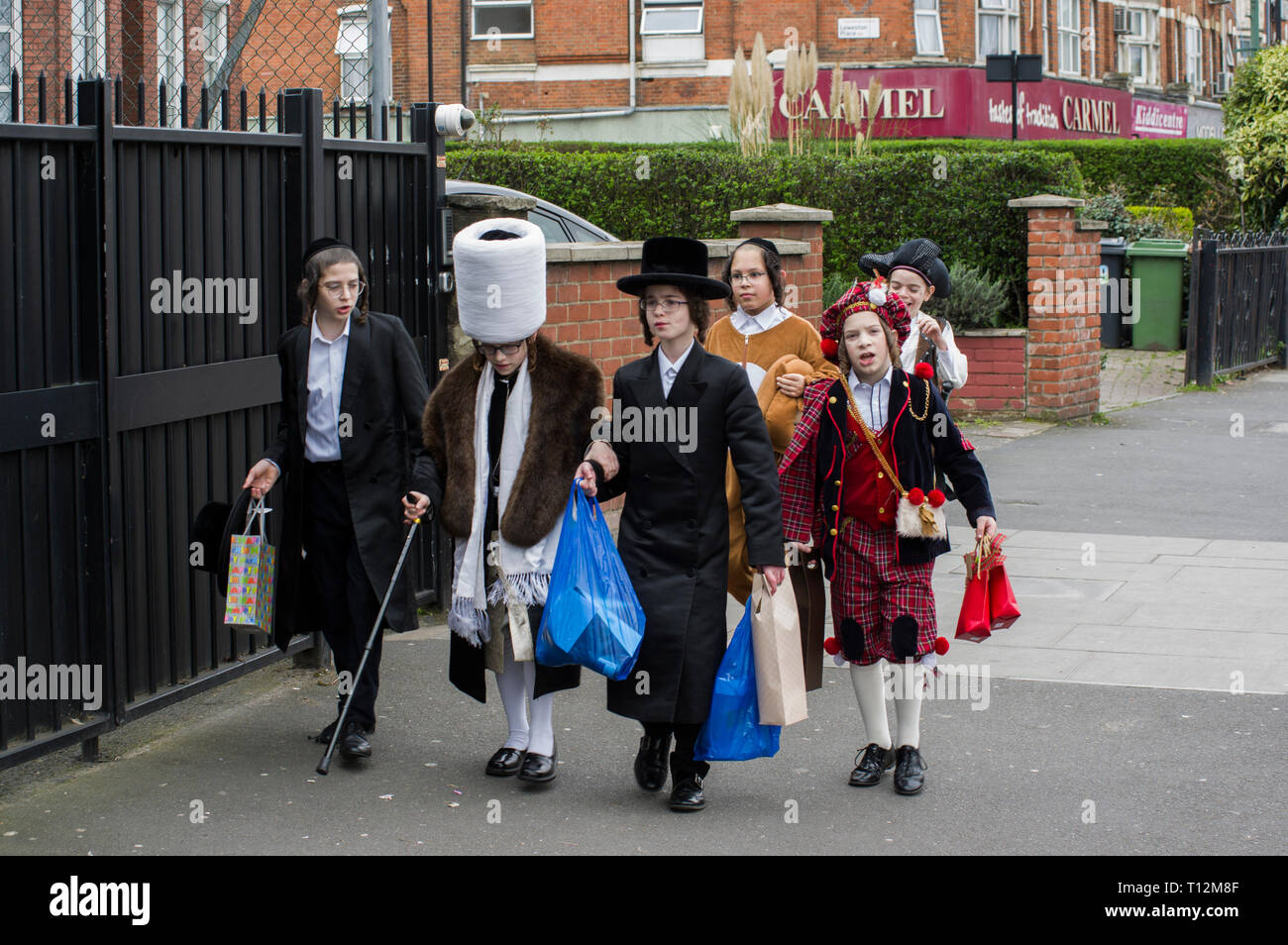 in fancy dress costumes for the Jewish 