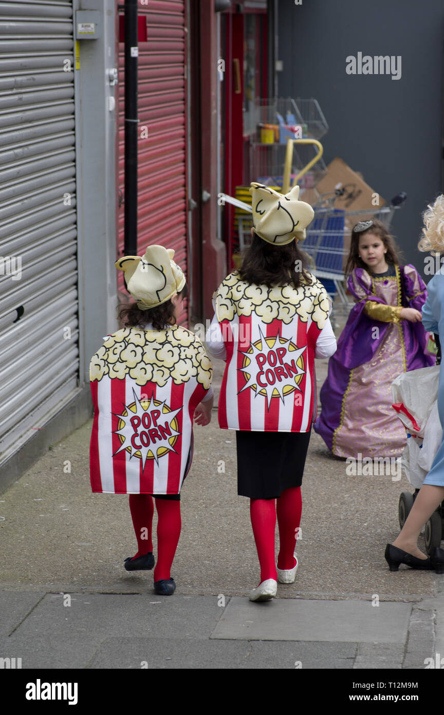 in fancy dress costumes for the Jewish holiday of Purim in Stamford Hill, the largest Hasidic community in Europe London 21 March 2019, Stock Photo