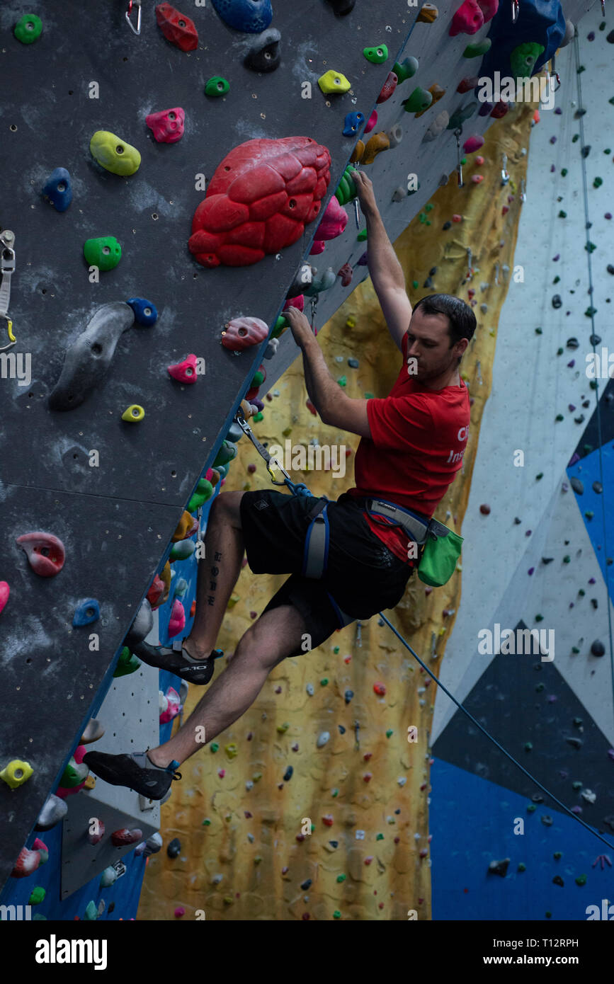 Man indoor rock wall hi-res stock photography and images - Alamy