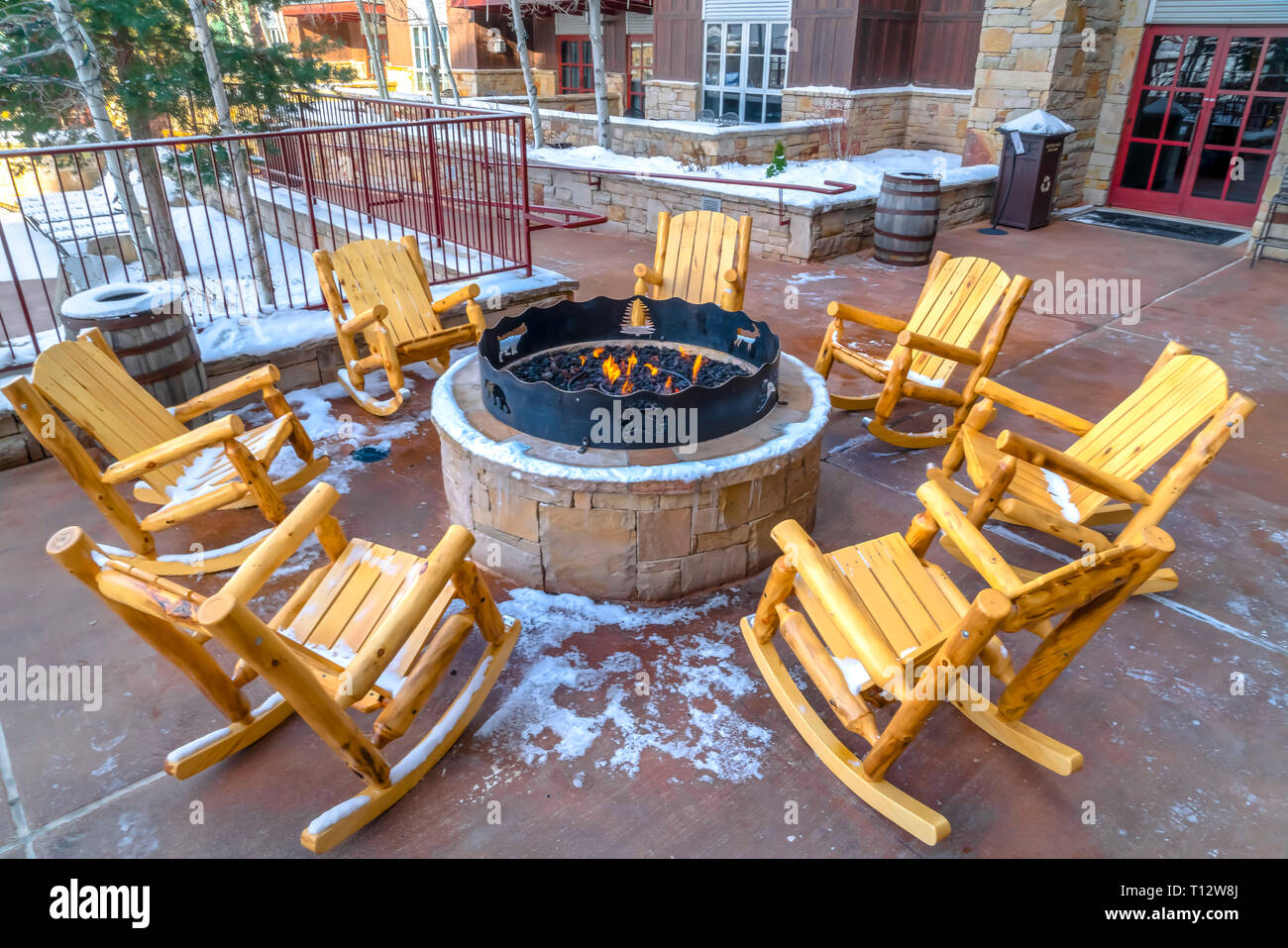 Patio With Wooden Rocking Chairs Around A Fire Pit Patio Of A