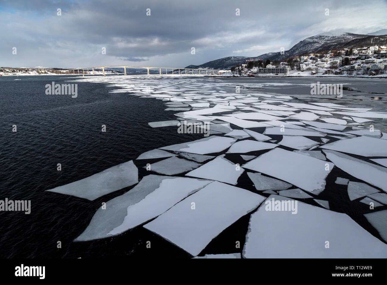 Broken sea ice in the water around the Norwegian Fjords, above the ...