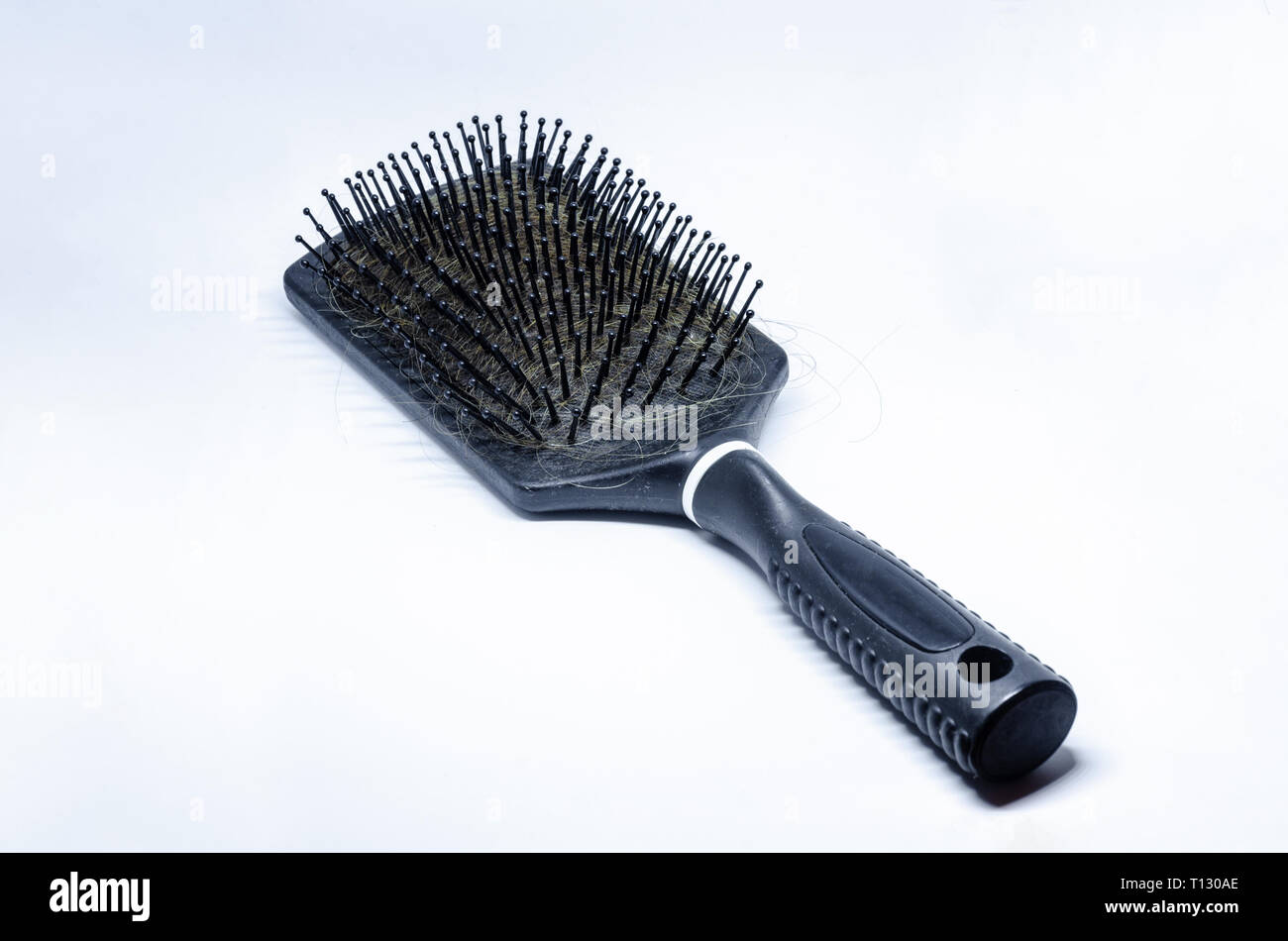 Hair hairbrush hi-res stock photography and images - Alamy