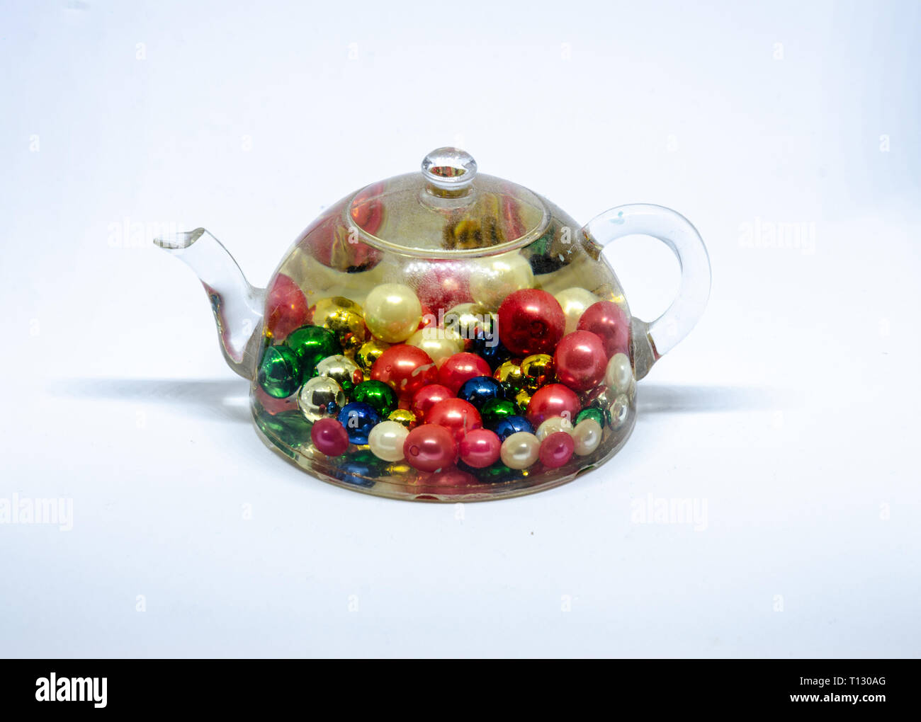 Paperweight in the form of a teapot Stock Photo Alamy