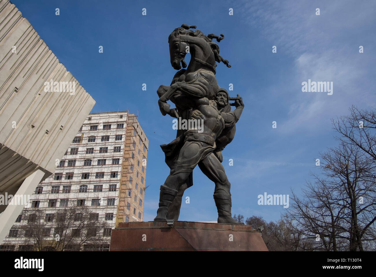 The Sports Palace building with the warrior legend Kojomkul sculpture ...