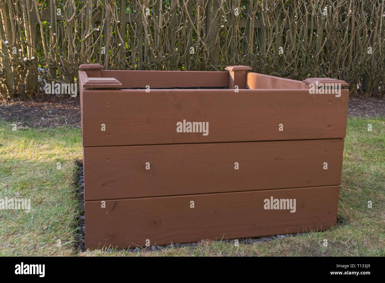 Wooden garden raised bed, three feet square Stock Photo