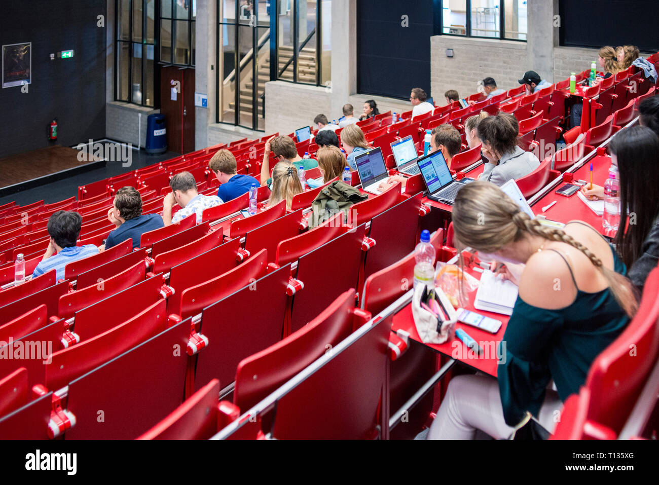 A large sloped lecture theatre classroom at a dutch university. Stock Photo