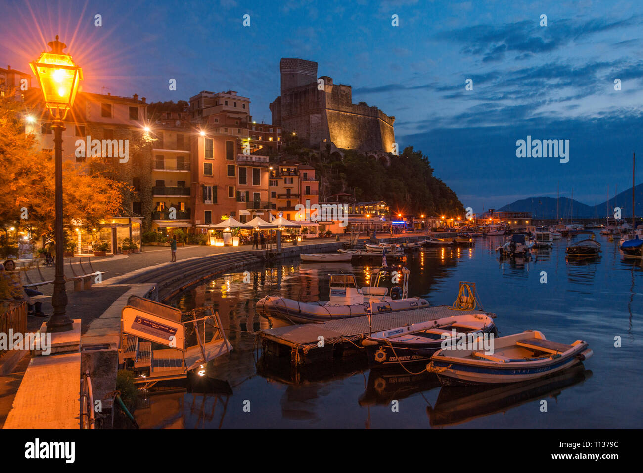 Lerici, near the Cinque Terre on the Ligurian coast of Italy. This view is of the harbour. In the distance is Porto Venere. Stock Photo