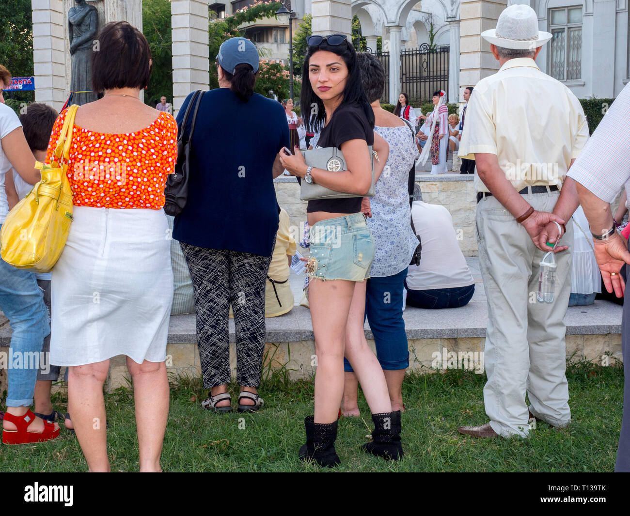 Romanians listen to an outdoor musical performance. Stock Photo