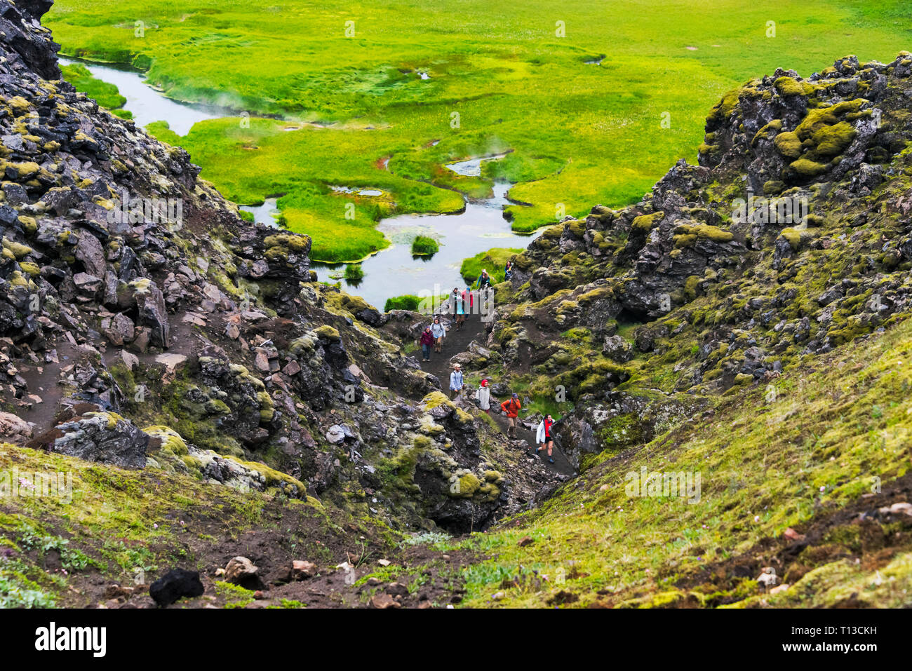 Tourists hiking in Landmannalaugar, Iceland Stock Photo