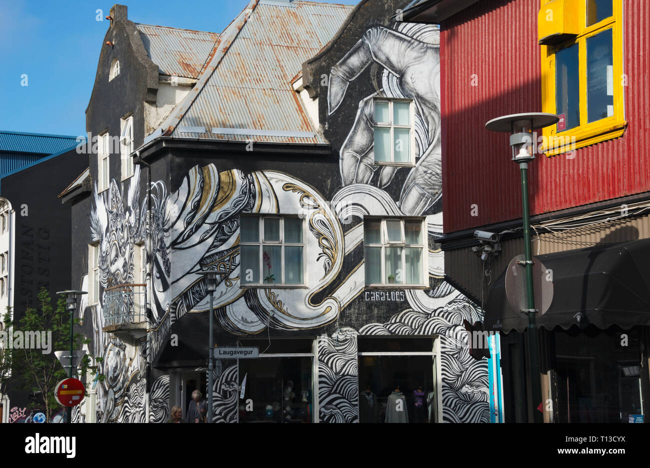 Old house painted with murals in city center of Reykjavik, Iceland Stock Photo