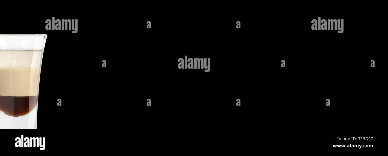 Alcoholic shot b-52 on a black background. Close-up. Place for text. Banner. Stock Photo