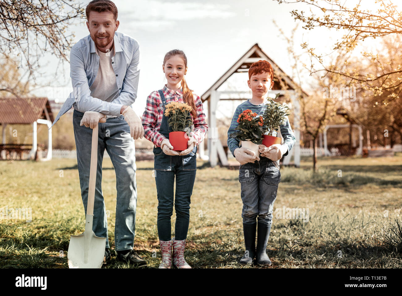 Happy family for their man in village Stock Photo