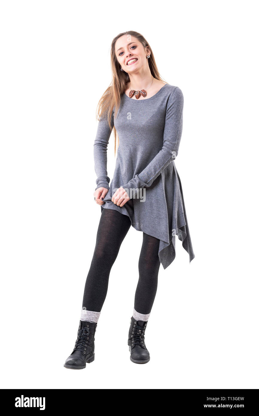 https://c8.alamy.com/comp/T13GEW/playful-young-happy-stylish-woman-getting-dressed-pulling-up-tights-full-body-isolated-on-white-background-T13GEW.jpg