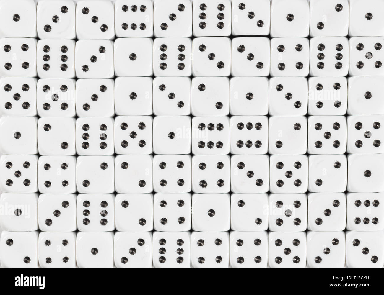 Background pattern of 70 white dices, random ordered Stock Photo