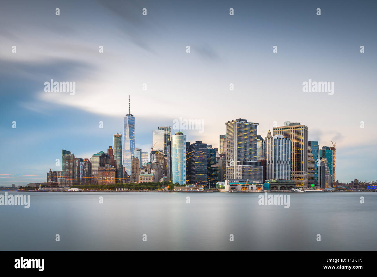 New York, New York, USA skyline on the bay at twilight from Governor's Island. Stock Photo